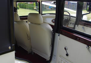 An old-fashioned style chauffeur saloon
